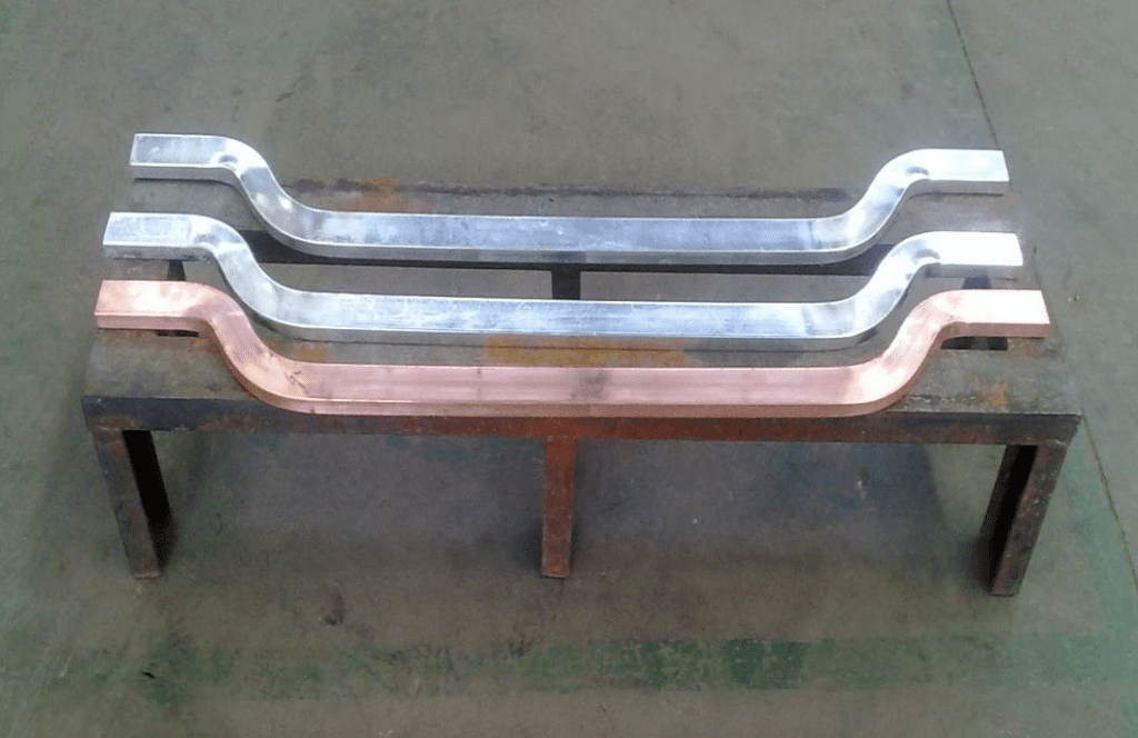 hanger bar before and after applying alloy layer